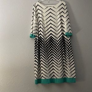 Multi color dress. Black/white with teal accent. Long sleeve. Size 2x new